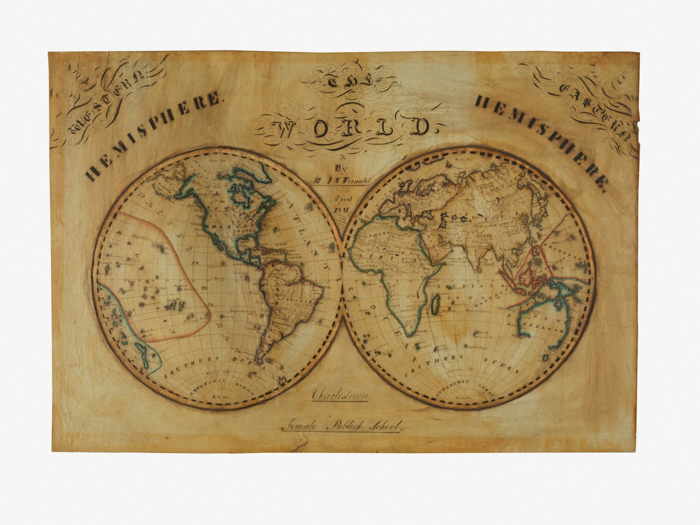 Un mapa del mundo antiguo que muestra los continentes en dos hemisferios.